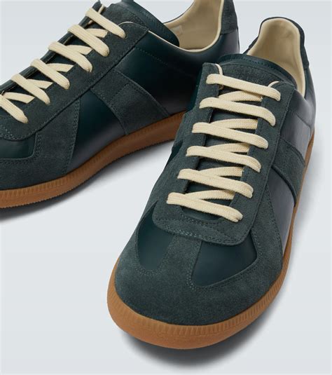 MAISON MARGIELA Replica leather and suede sneakers .